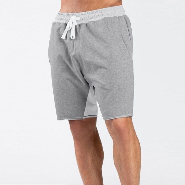 model wearing grey color shorts
