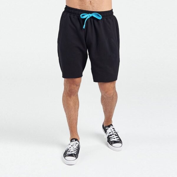model wearing black color shorts with blue laces